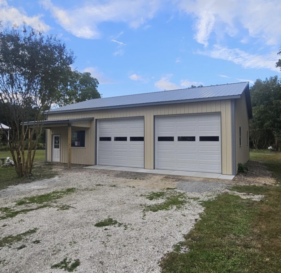 Three-car brick garage